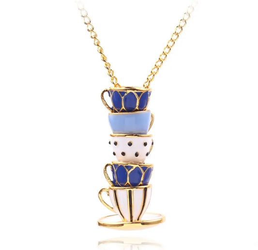 Gold tone necklace with stacked blue enamel tea cup charms