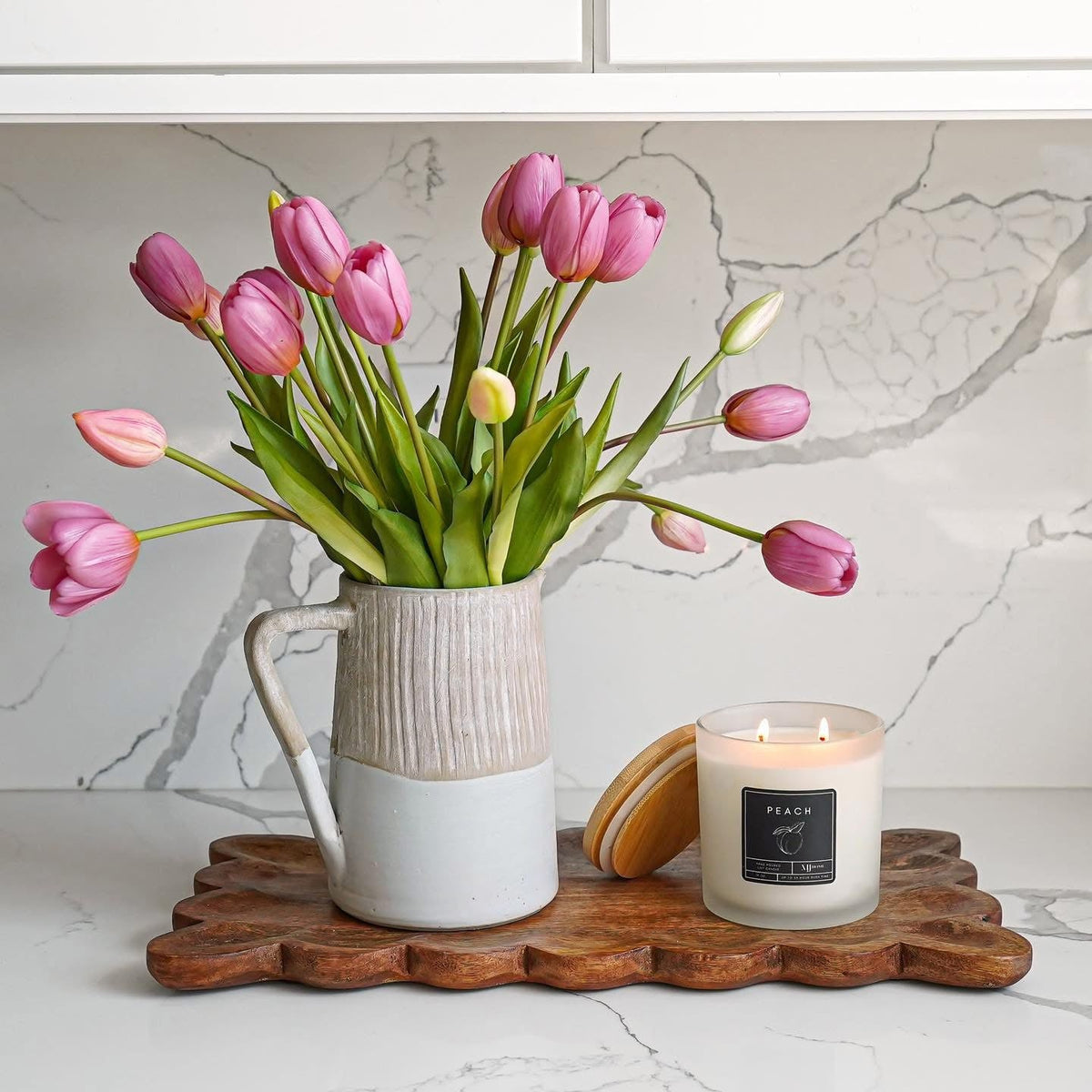 Pink tulip bouquet with green stems and leaves, tulip flower heads