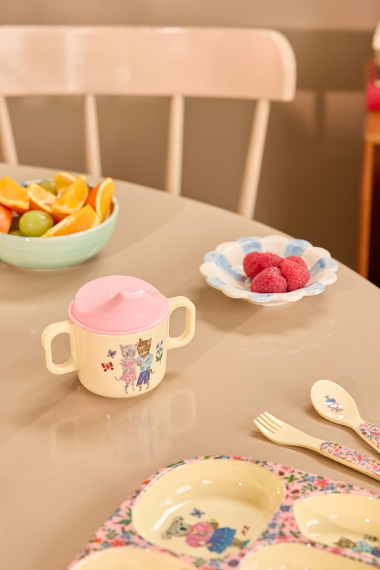 Two-handle melamine cup with pink lid and illustrated animal scene print