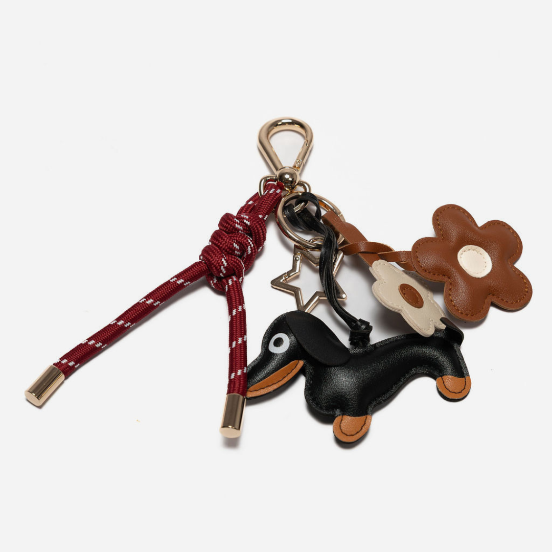 Burgundy key chain with black dog and brown flower leather charms, metal clip