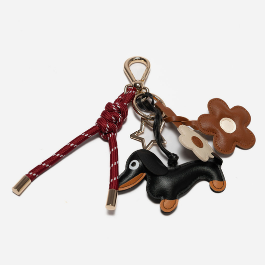 Burgundy key chain with black dog and brown flower leather charms, metal clip