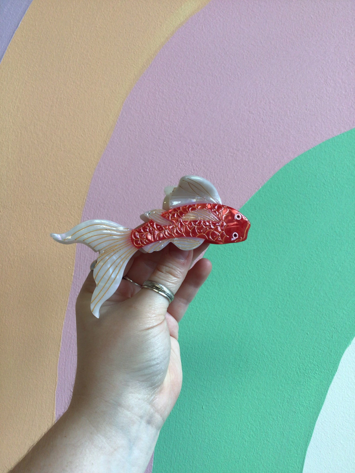 Koi fish hair claw with red body and white trailing fins