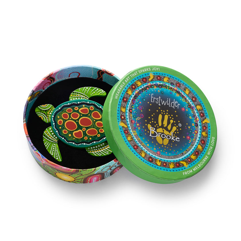 Turtle brooch backs: green circle with Erstwilder Broke branding and multicolor edge