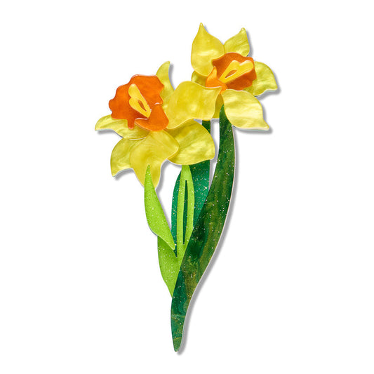 Daffodil flower brooch with yellow and orange blooms and green leaves