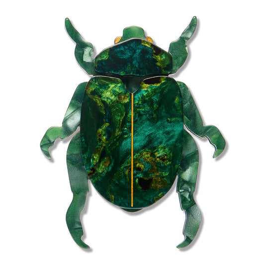 Green enamel beetle brooch with gold accents and hinged pin back