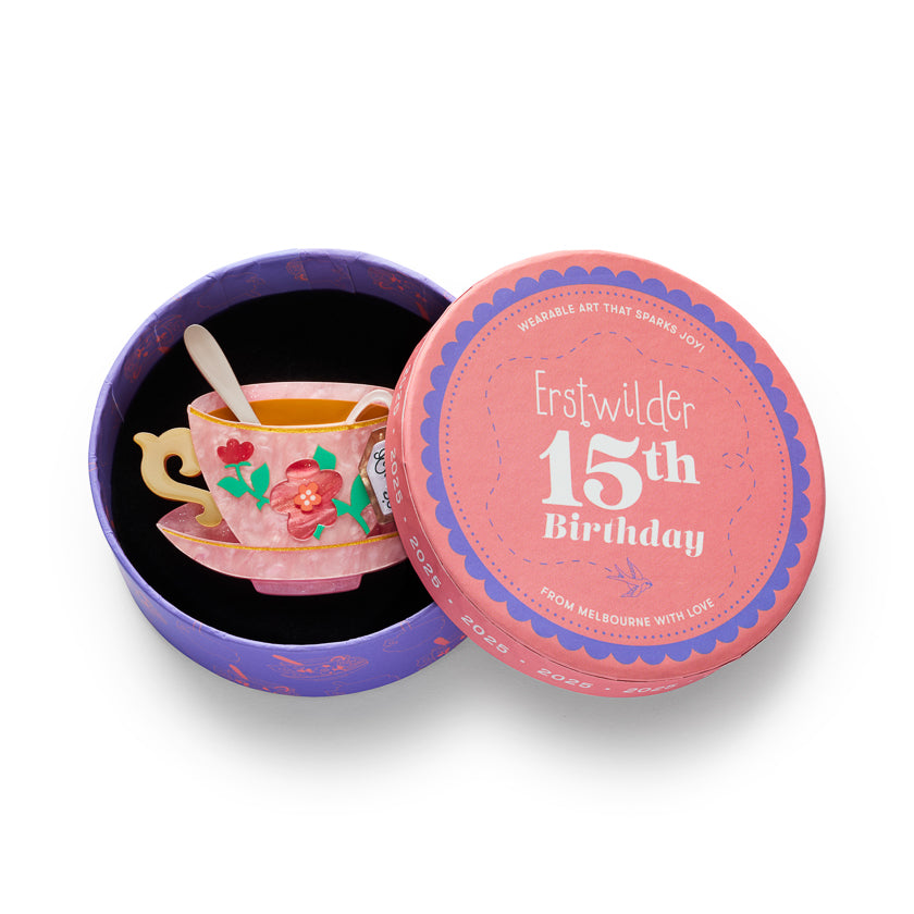 Erstwilder circular brooch back with purple base and 15th Birthday text