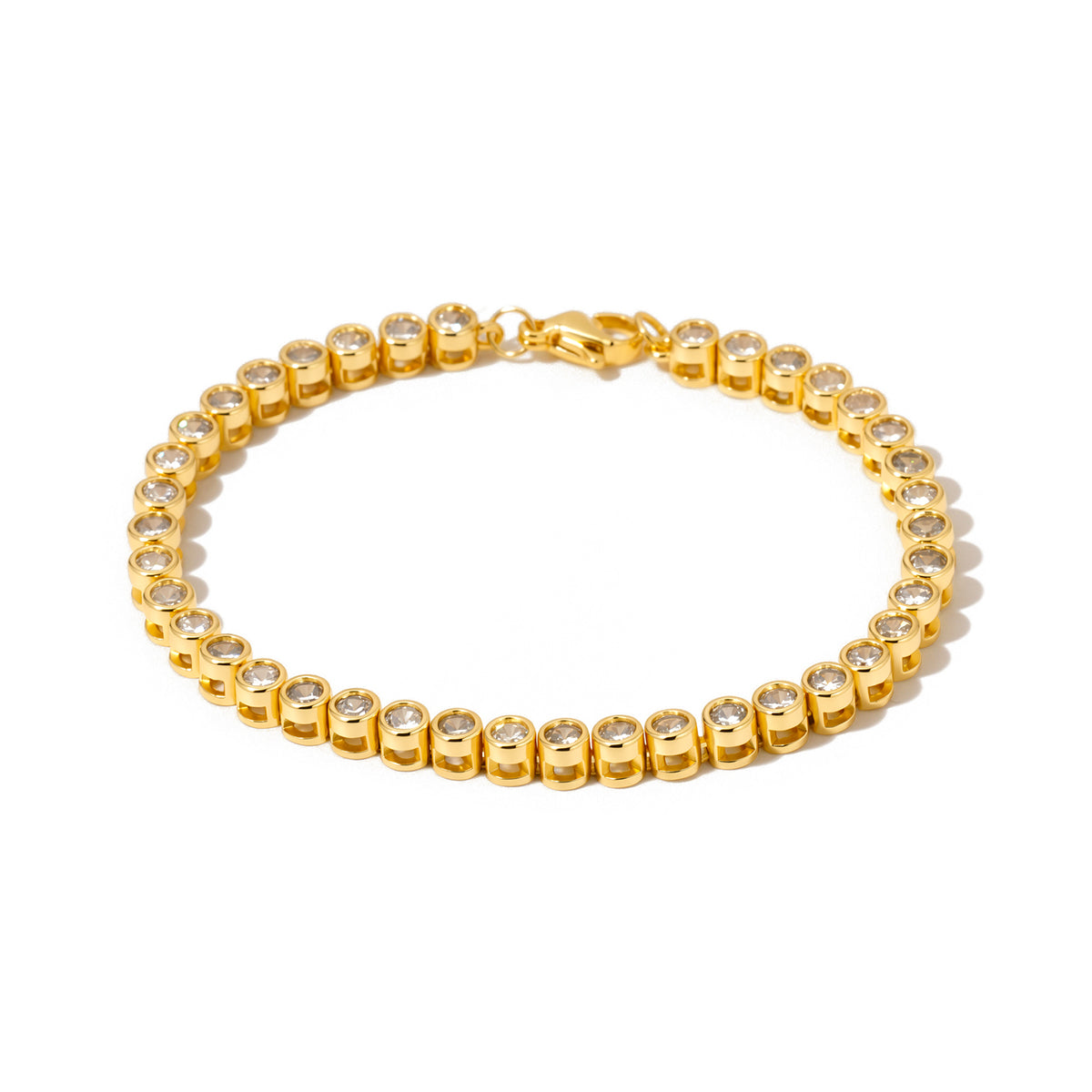 Gold tennis bracelet with round clear stones