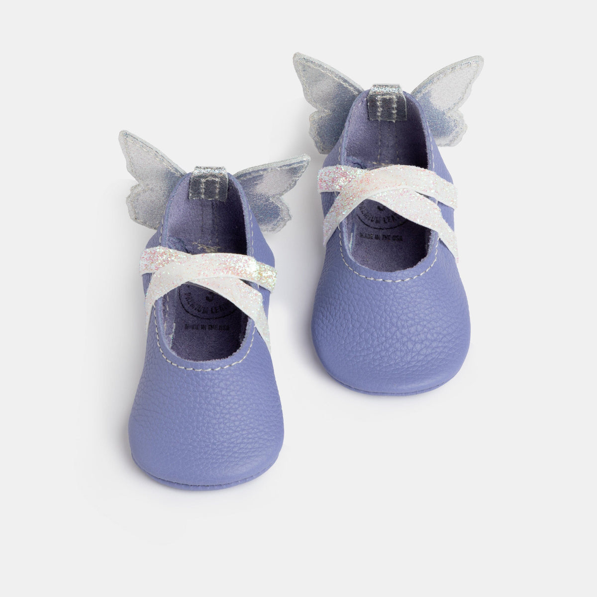 Lilac baby ballet slippers with glitter bow, ribbon tie, and scalloped butterfly wings