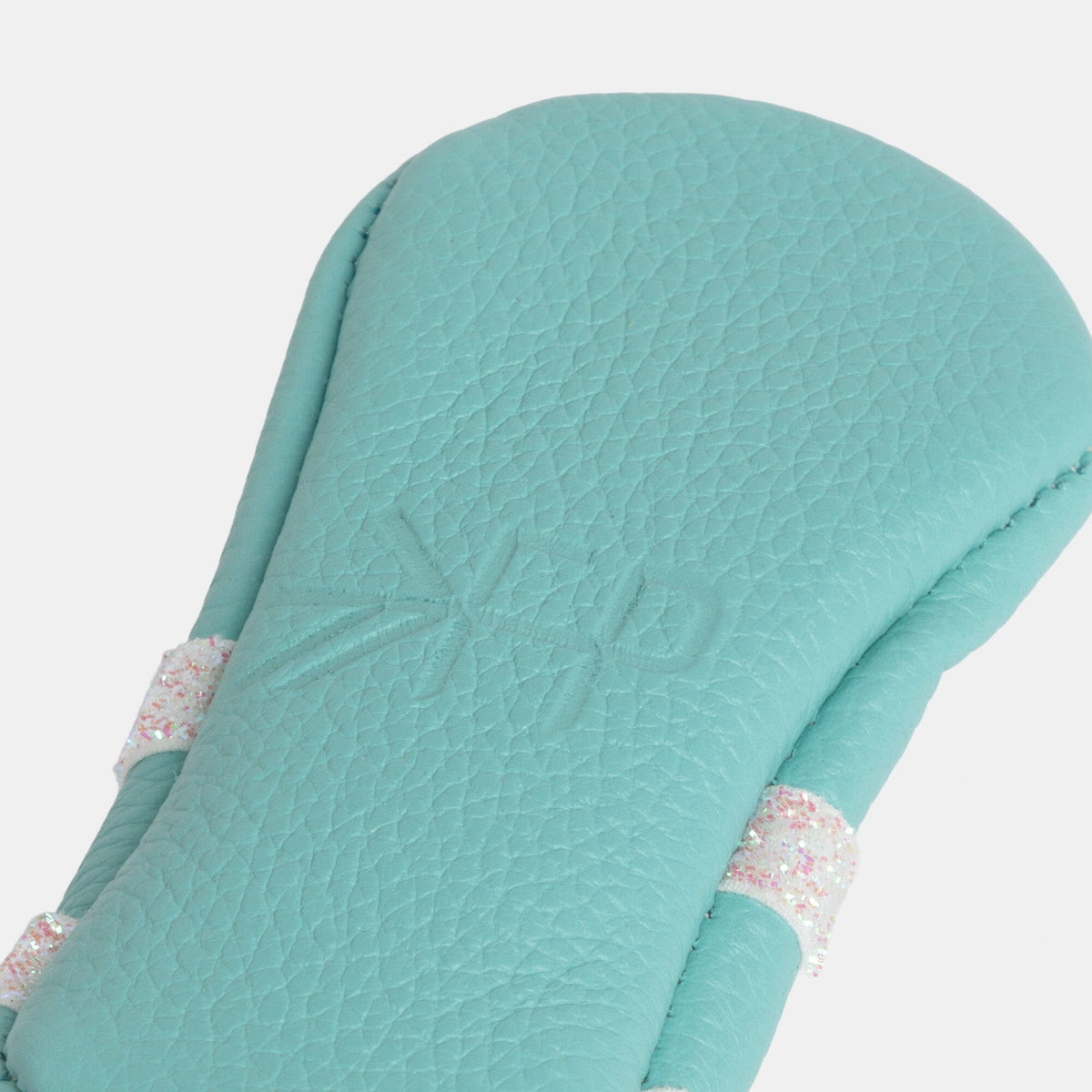 Turquoise leather-look baby slipper upper with embossed logo detail
