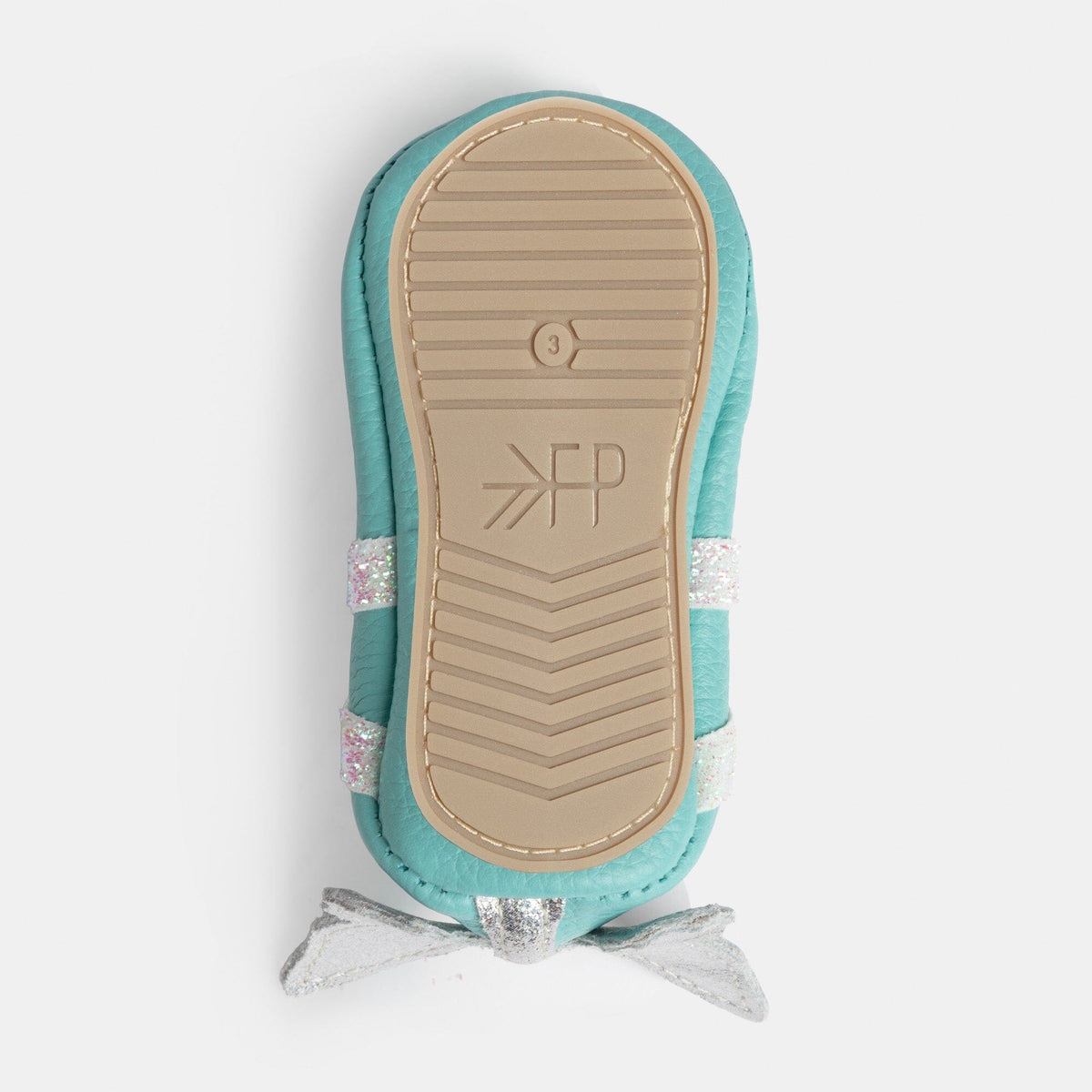 Turquoise baby slipper outsole with textured tread and logo print