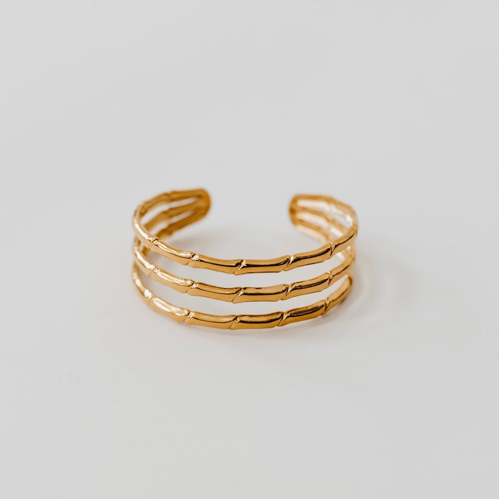 Gold bamboo tier open bangle bracelet with stacked bar links, open cuff style