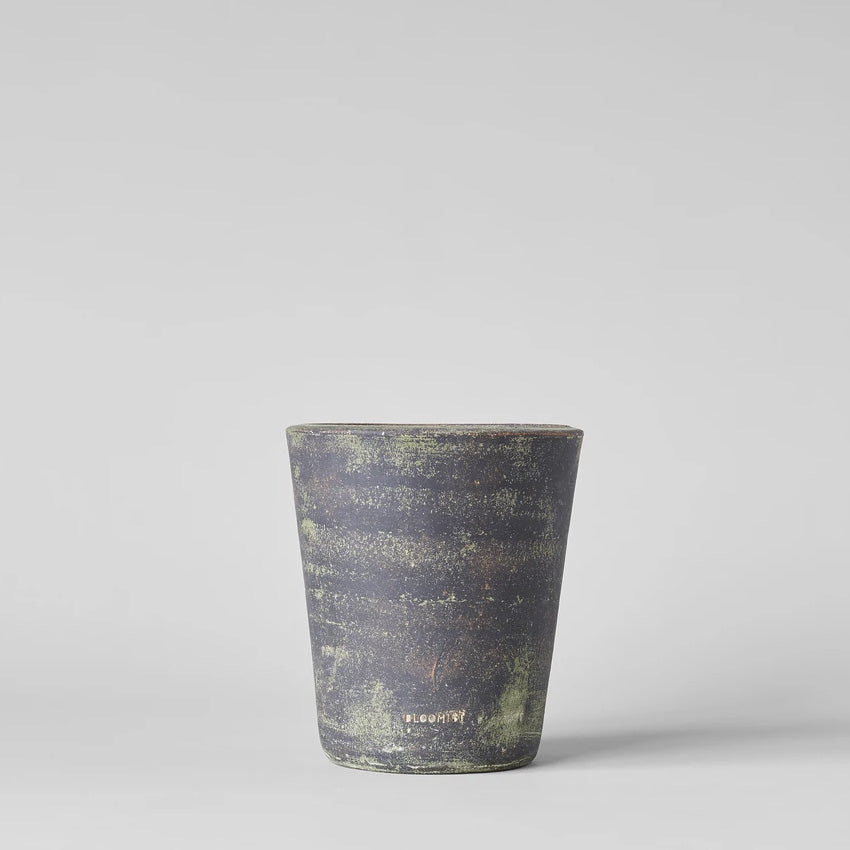 Grey patina terra cotta planter pot, speckled metallic finish on tapered cylinder