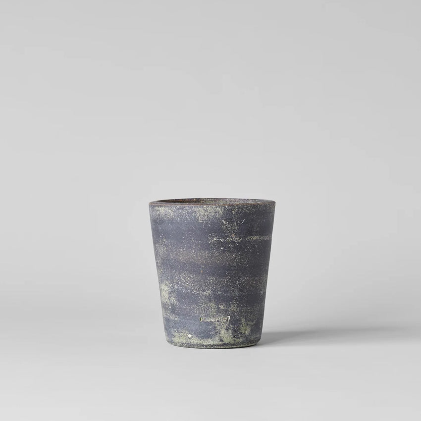 Grey patina terra cotta planter pot, speckled surface with subtle golden highlights
