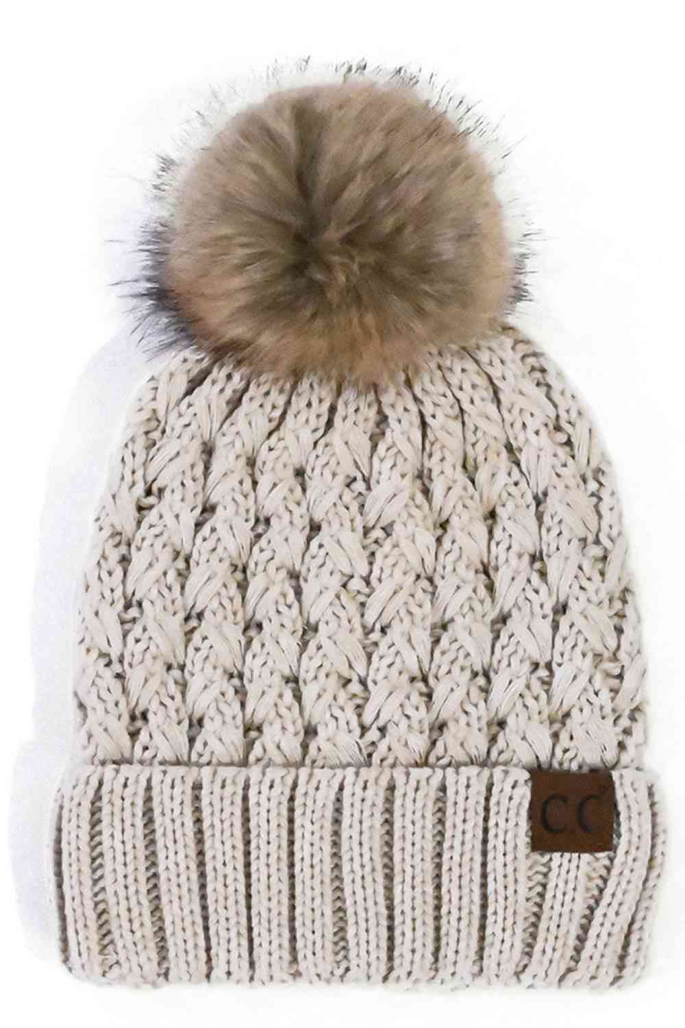 Knit beanie with pom-pom, beige cable pattern, ribbed cuff and C.C. label patch