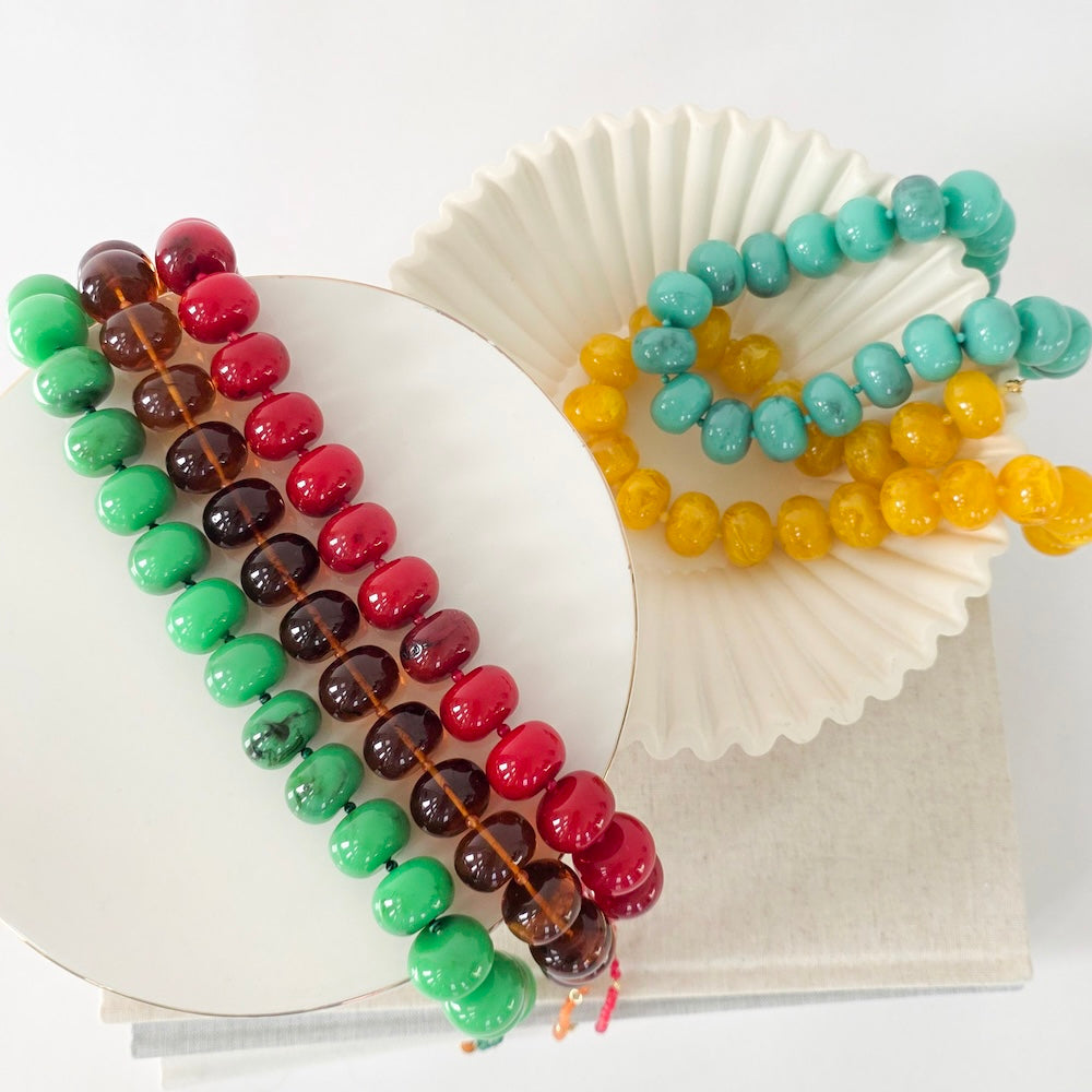 Multi-color beaded necklace with teal, amber and red beads