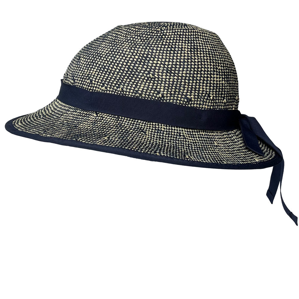 Woven straw bike helmet with navy band and chin tie