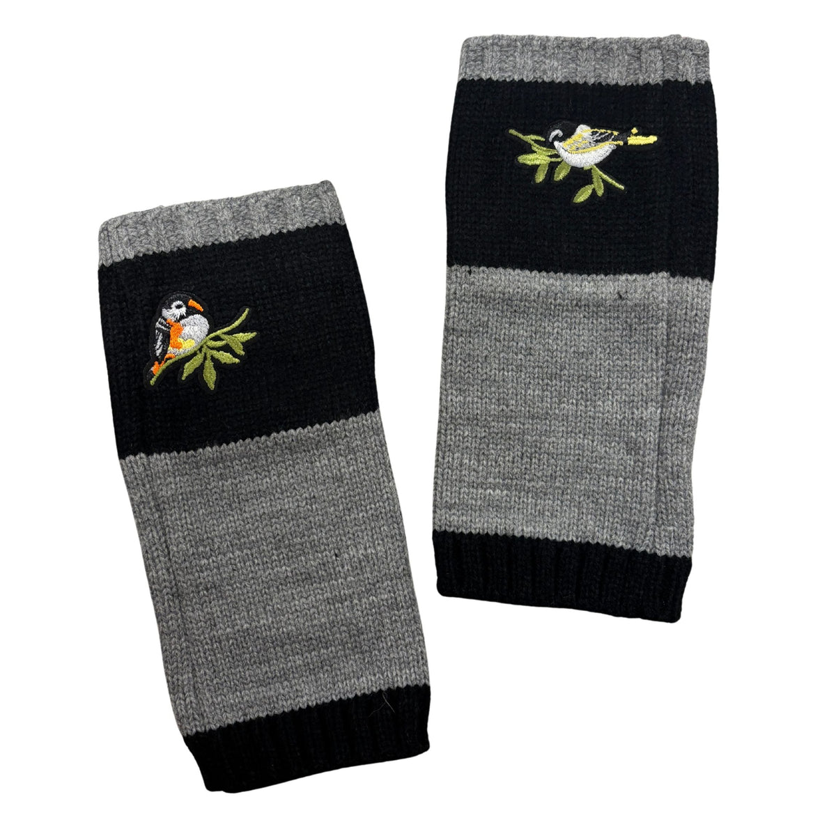 Pair of black and gray knitted arm warmers with bird applique and striped cuffs