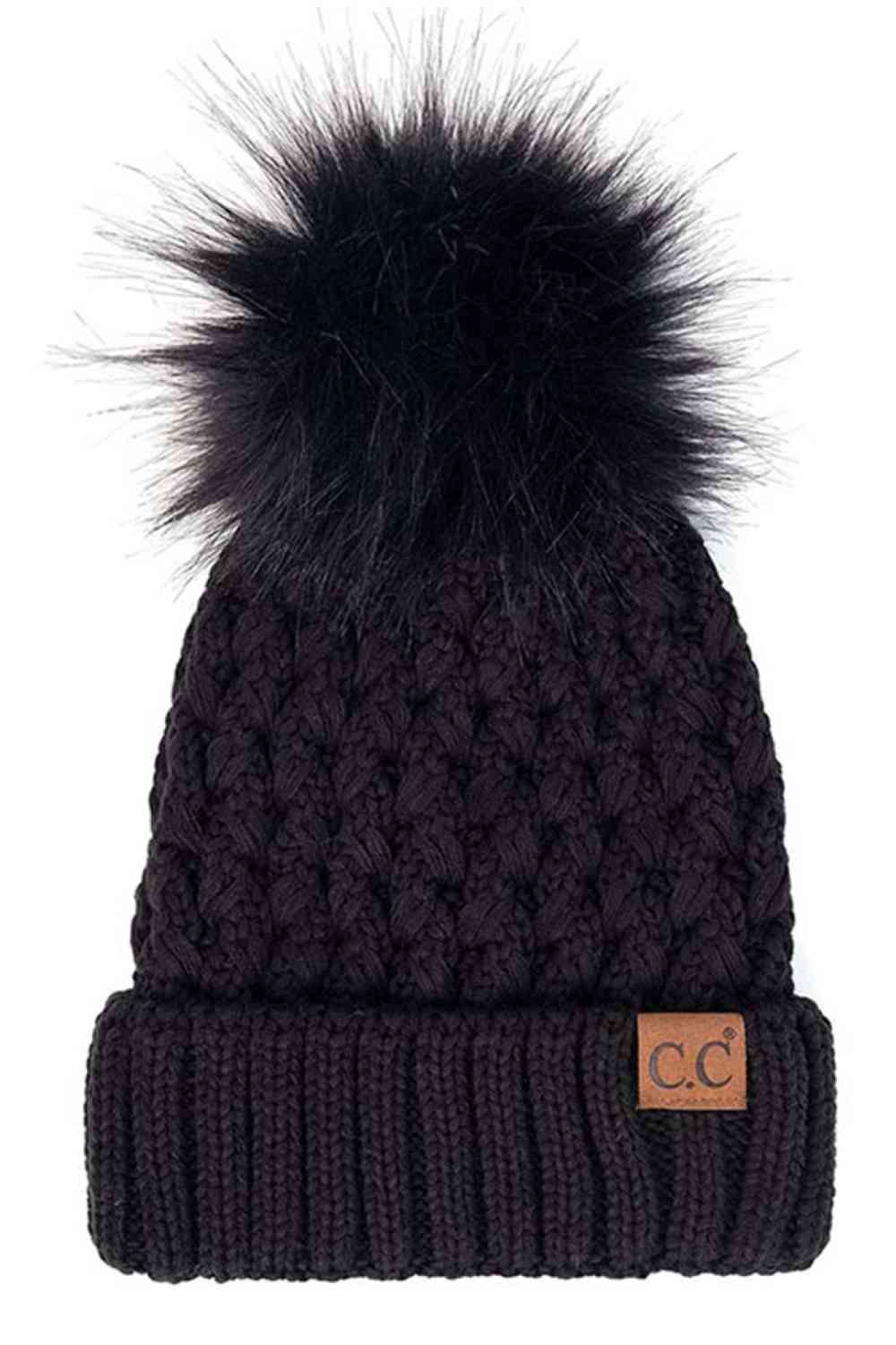 Knit beanie with pom-pom, black cable knit texture, ribbed cuff and C.C. label patch