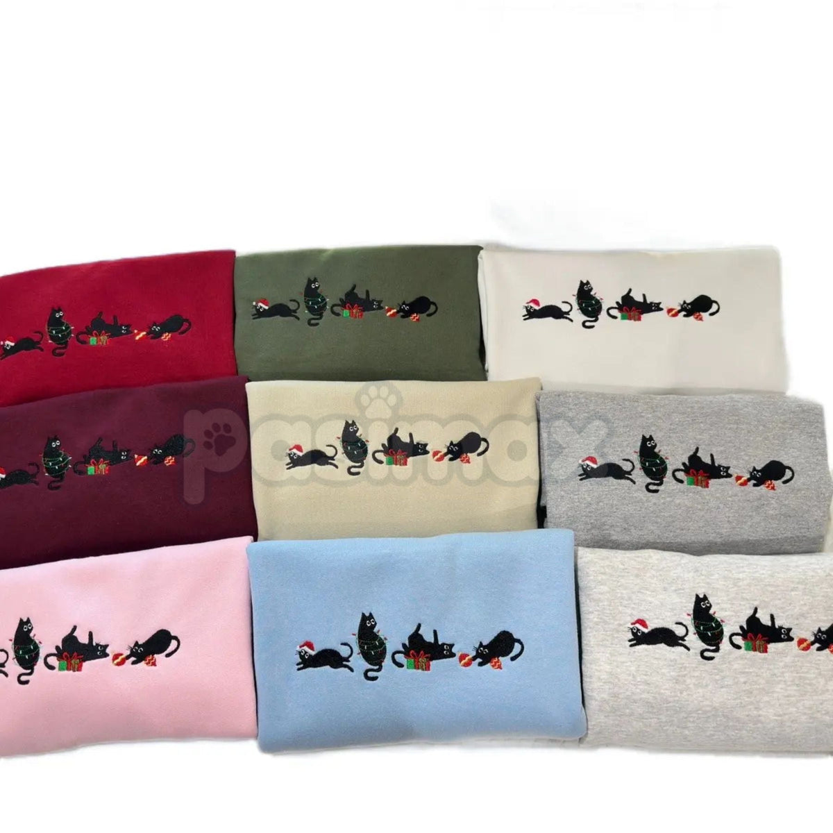 Folded crewneck sweatshirts with black cat holiday embroidery, assorted colors