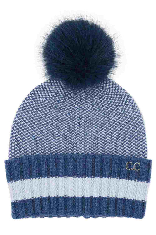 Two-tone knit beanie with pom-pom, blue patterned body and striped cuff