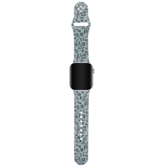 Light blue botanical print watch band with black smartwatch face