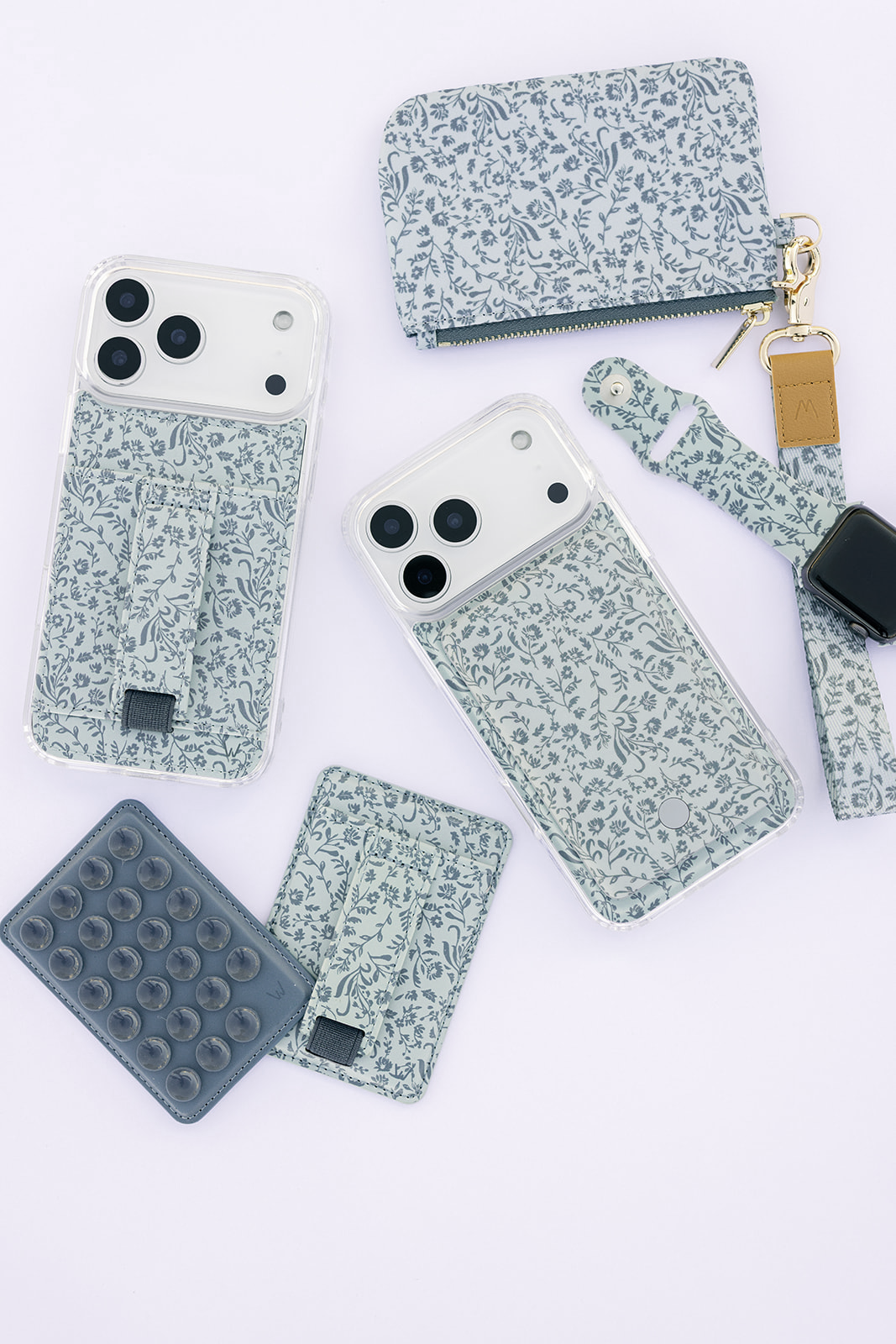 Light blue floral power accessory set: phone case, card charger, and wrist strap