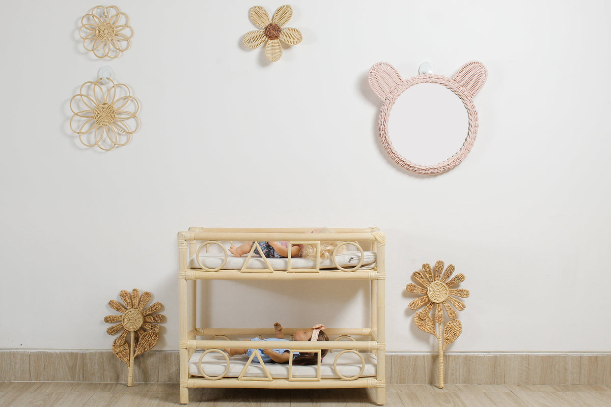 Natural rattan flower wall art set displayed above a bunk bed