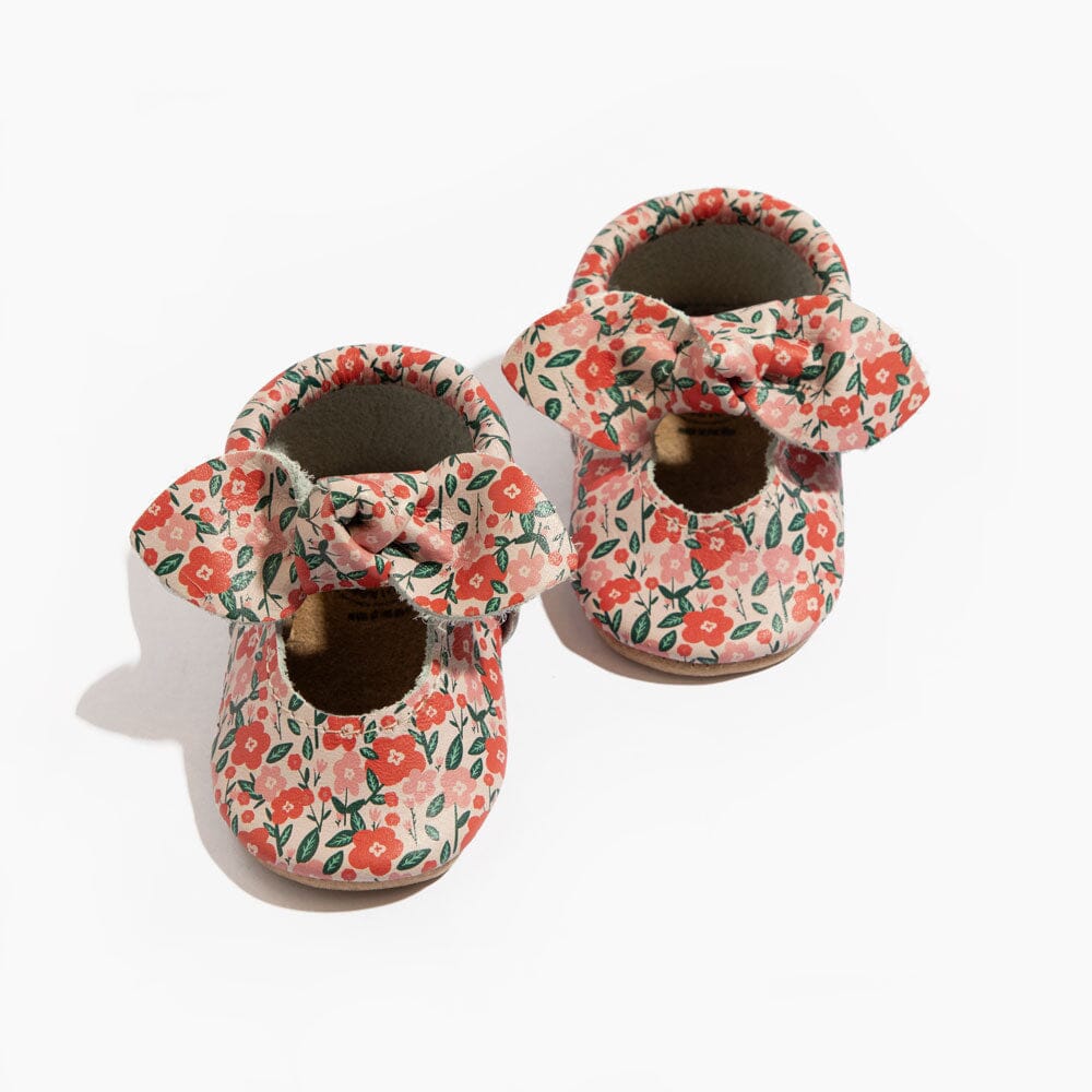 Floral baby shoes with knotted bow, soft uppers and fabric collar