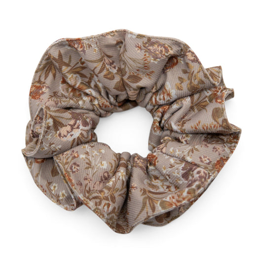 Floral hair scrunchie in beige with brown and rust leaves, gathered fabric