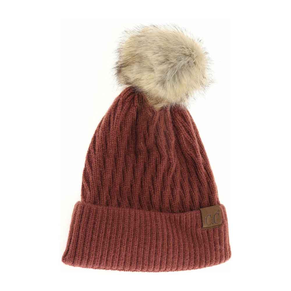 Rust knit beanie with faux fur pom-pom and C.C label patch
