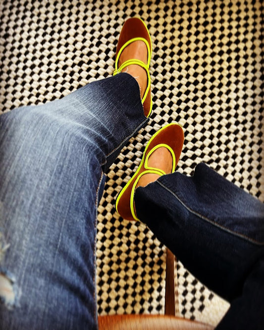 Camel Mary Jane flats with neon green trim and adjustable strap