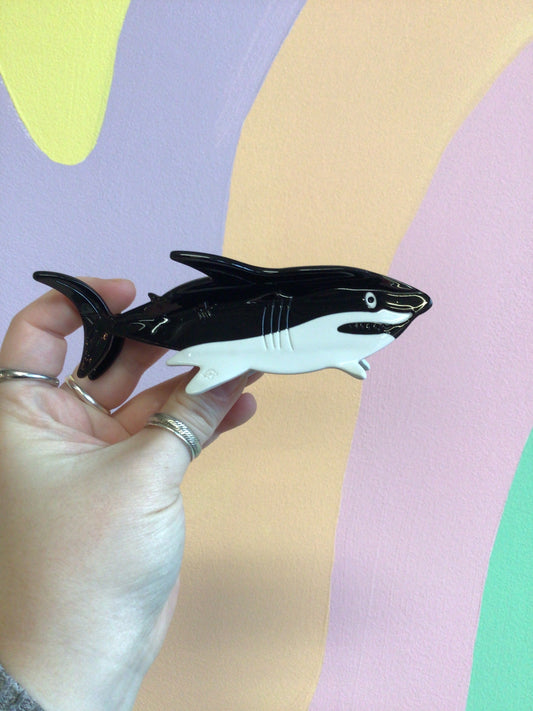 Black shark-shaped hair claw with snap barrette