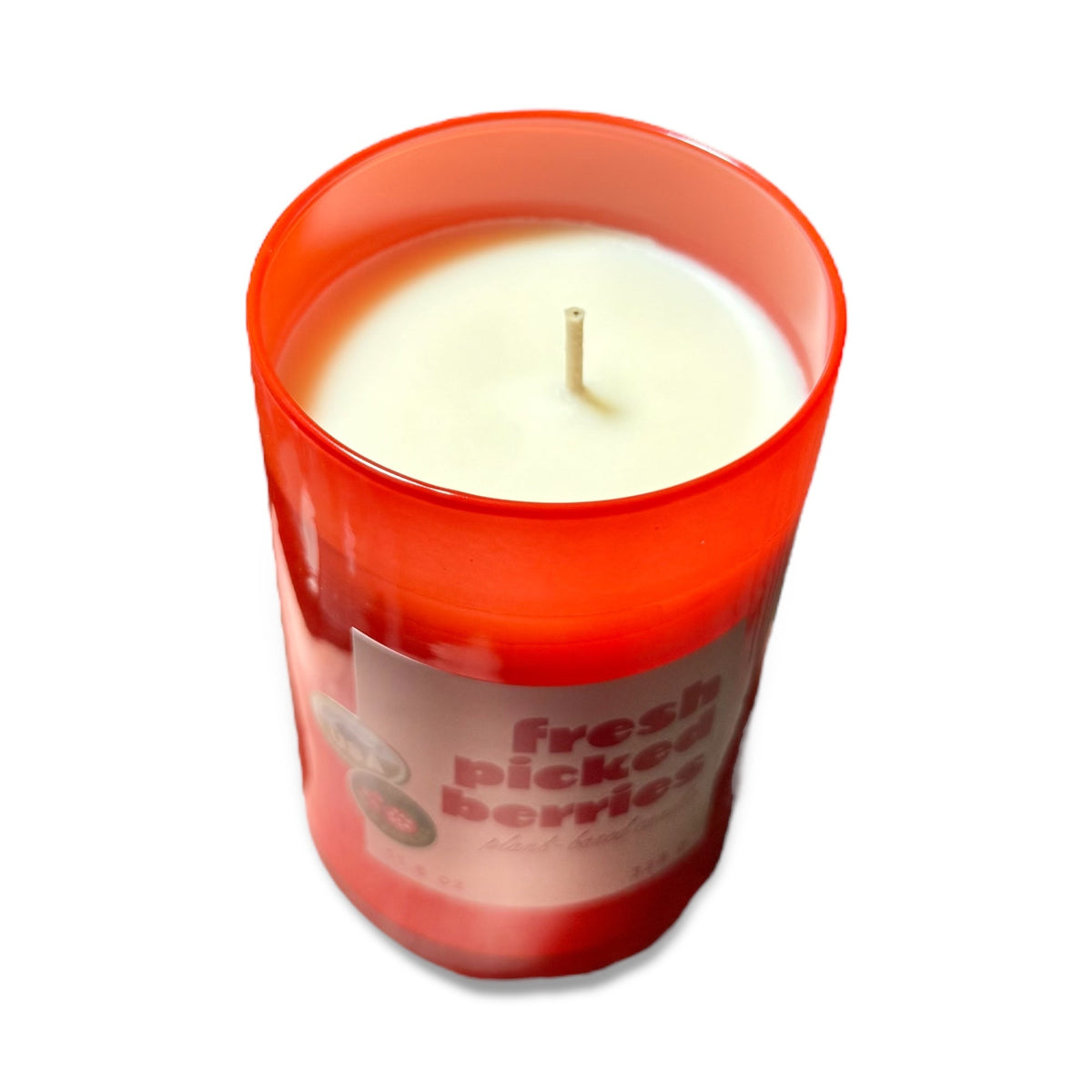Fresh Picked Berries glass candle jar with visible white wax and wick, front label.