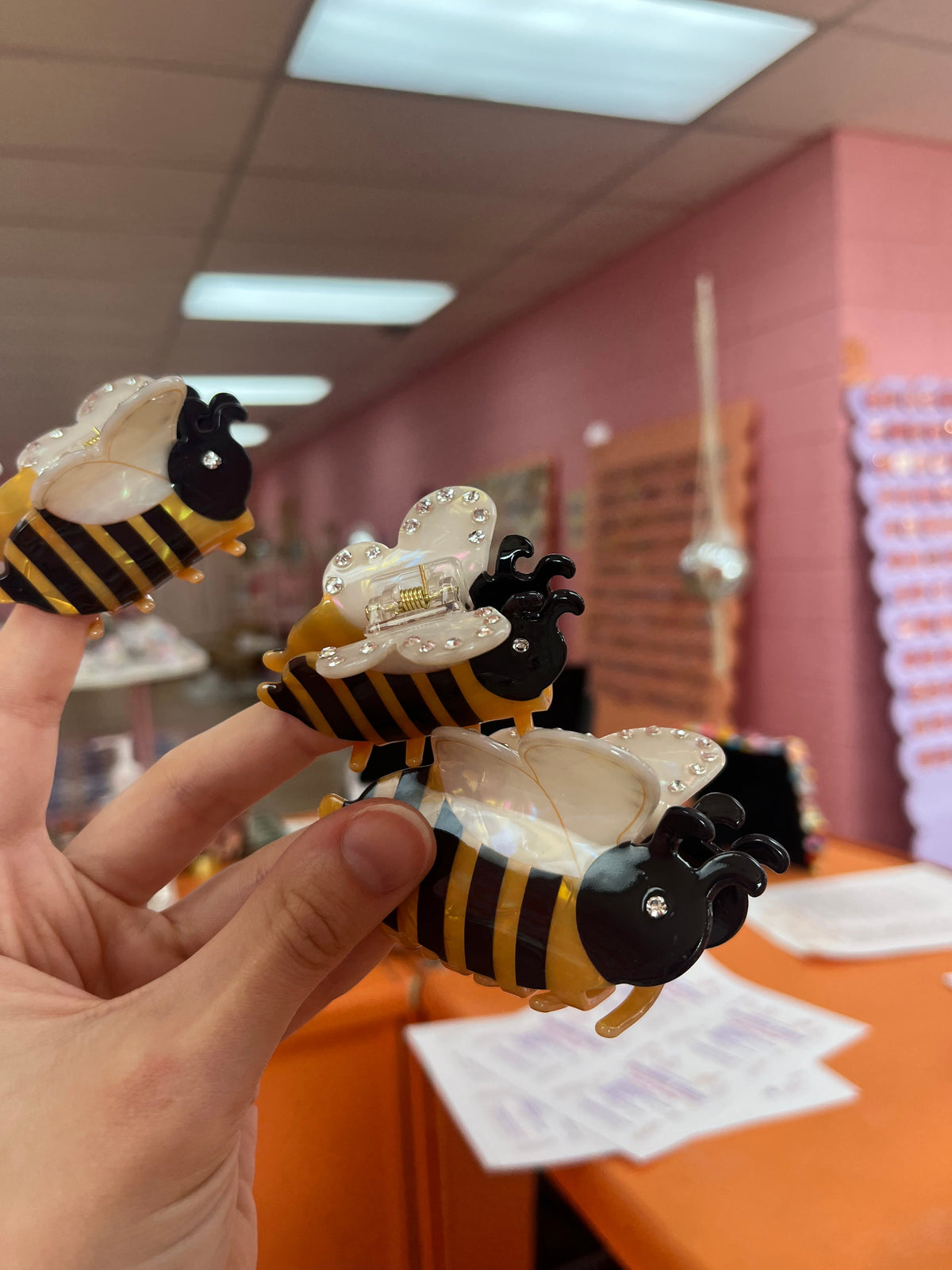 Mini bee hair claw, yellow and black striped, clear glitter wings
