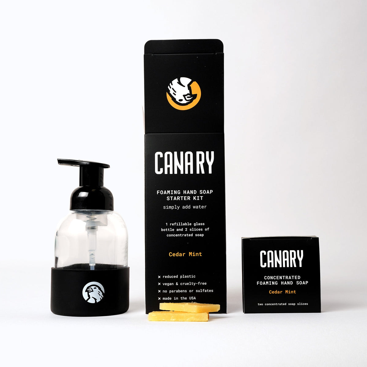 Canary hand soap kit with black-banded glass bottle, two Cedar Mint slices and refill box