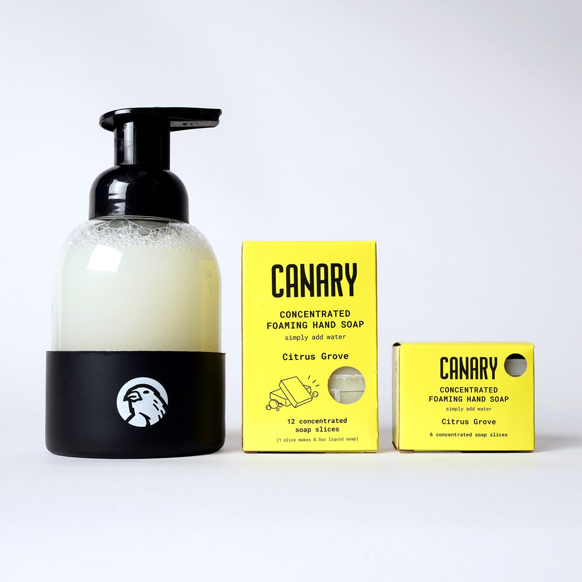 Canary Citrus Grove concentrated hand soap refill bars beside a foaming soap dispenser and cartons