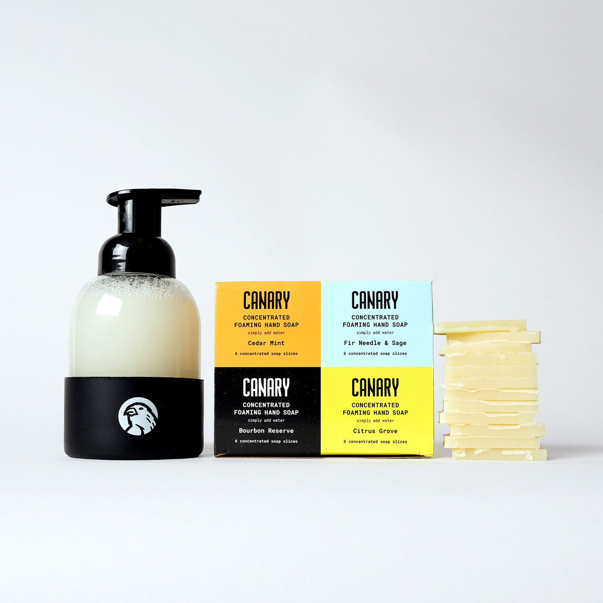 Concentrated hand soap refill gift set with four scent boxes, soap slices, and a pump bottle