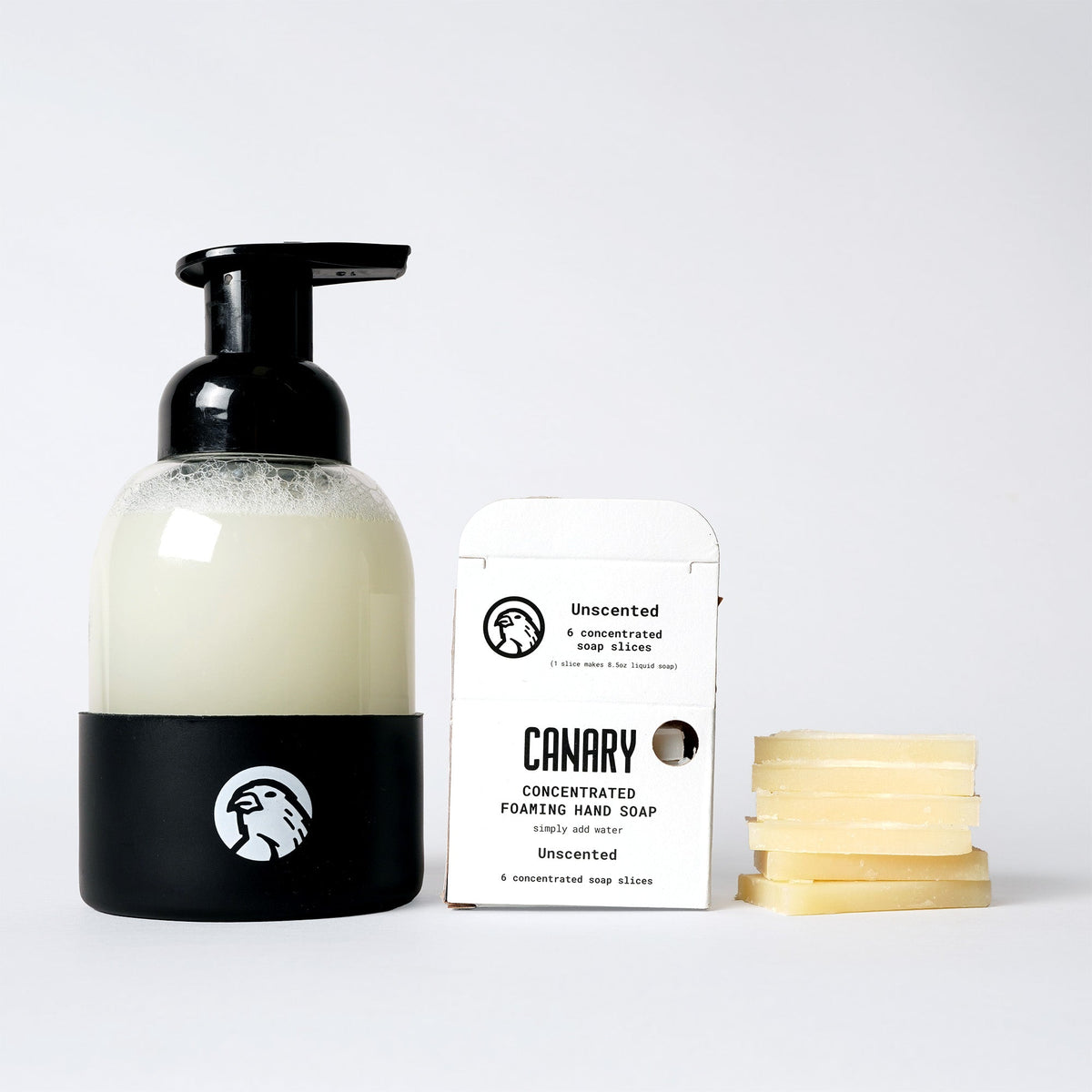 Unscented hand soap refill with pump bottle, carton, and several soap slices
