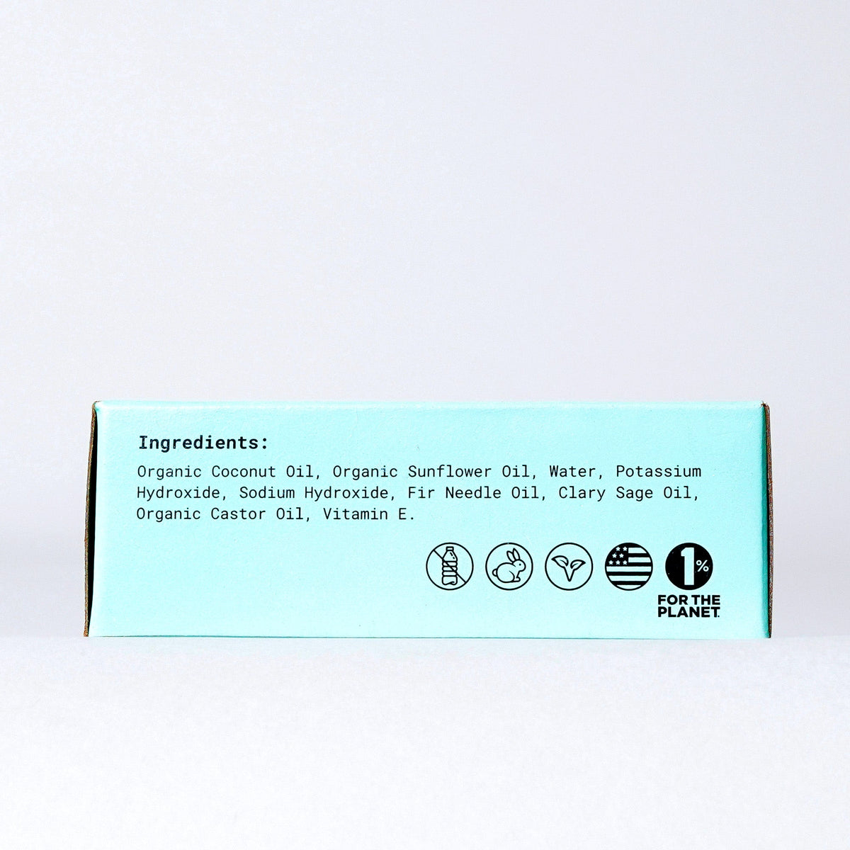 Side of turquoise Fir Needle and Sage soap refill box listing ingredients