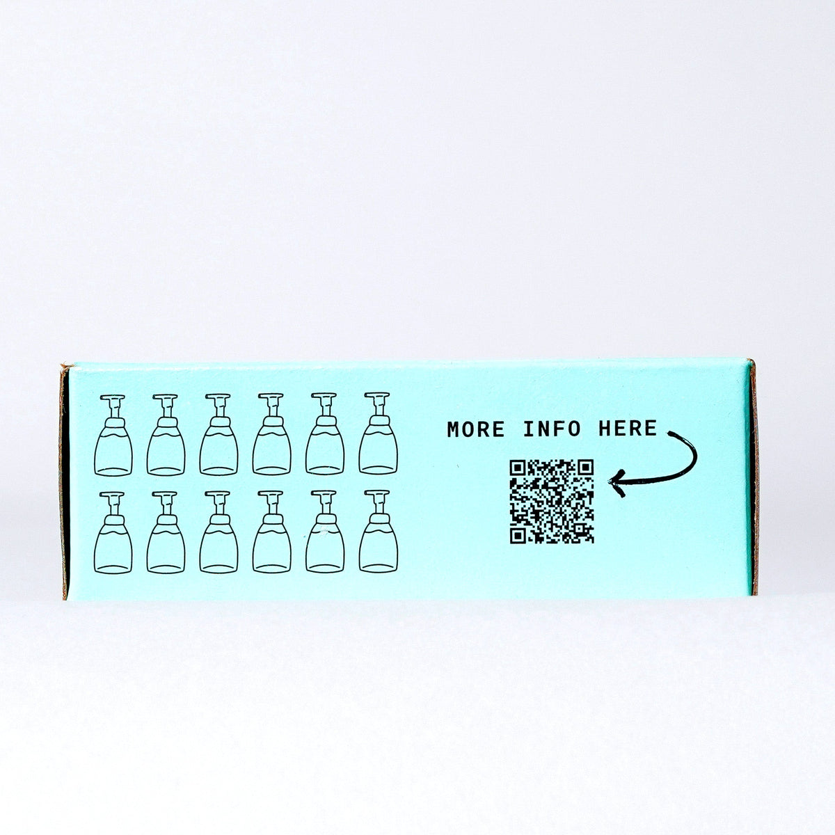 Side panel of hand soap refill box with bottle illustrations and a QR code