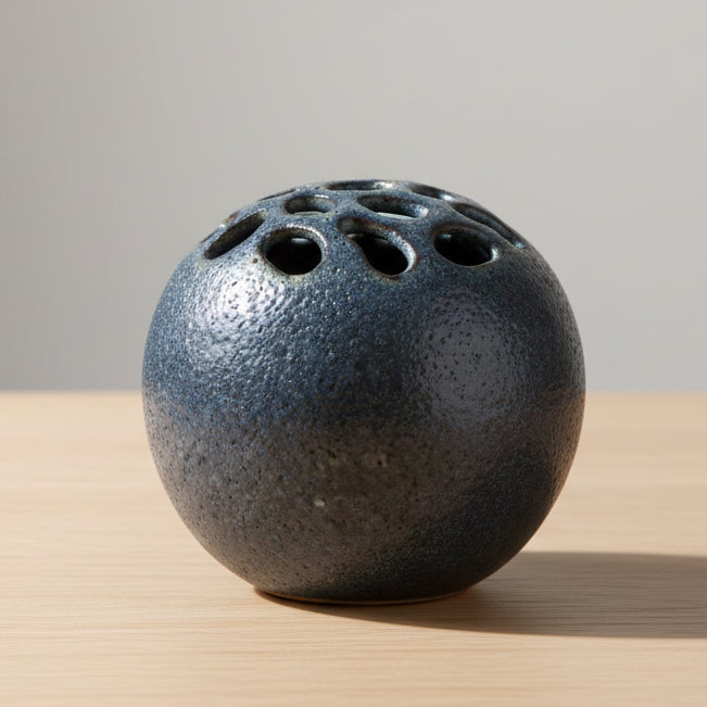 Blue-gray speckled ball flower frog vase with punched holes on top