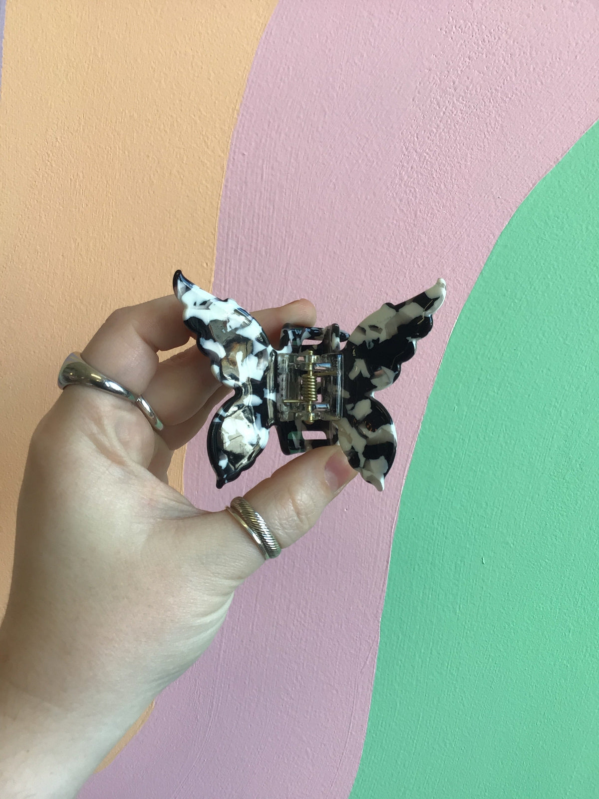 Butterfly hair claw, blue-white speckled with dark accents
