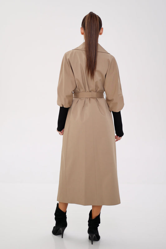 Miru camel trench coat shown from the back, with a belt and full-length cut