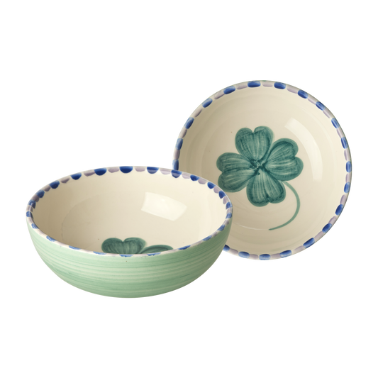 Ceramic serving bowl set with hand-painted green clover and blue speckled rims