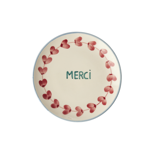 Ceramic cake plate with hand-painted Merci text and pink butterfly wreath border
