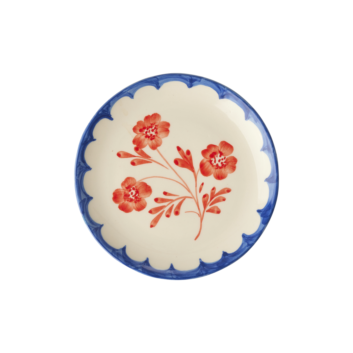 Round ceramic cake plate with scalloped blue rim and red vintage flower on white glaze
