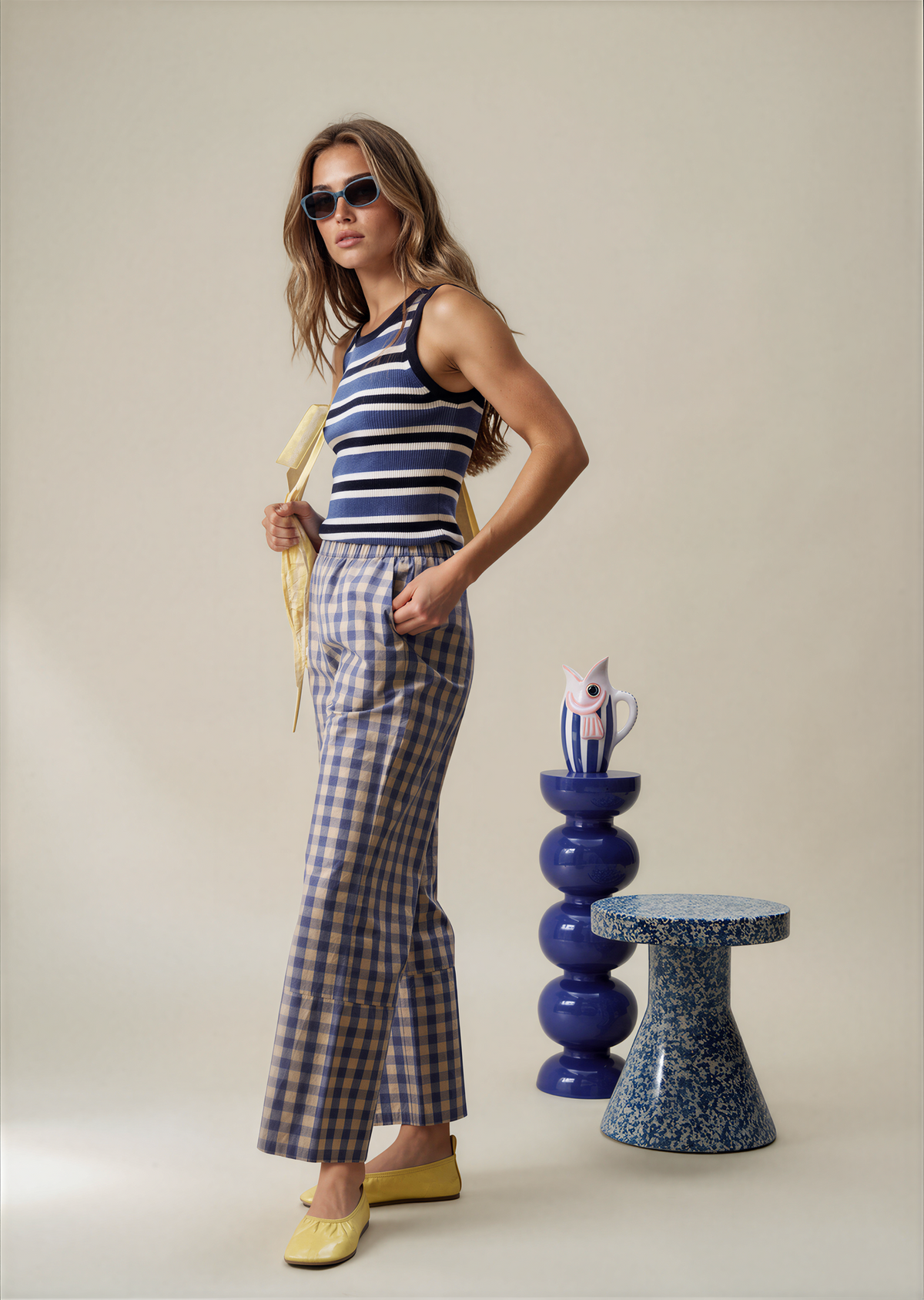 Blue and white gingham wide-leg pants with elastic waistband and ankle-length hem