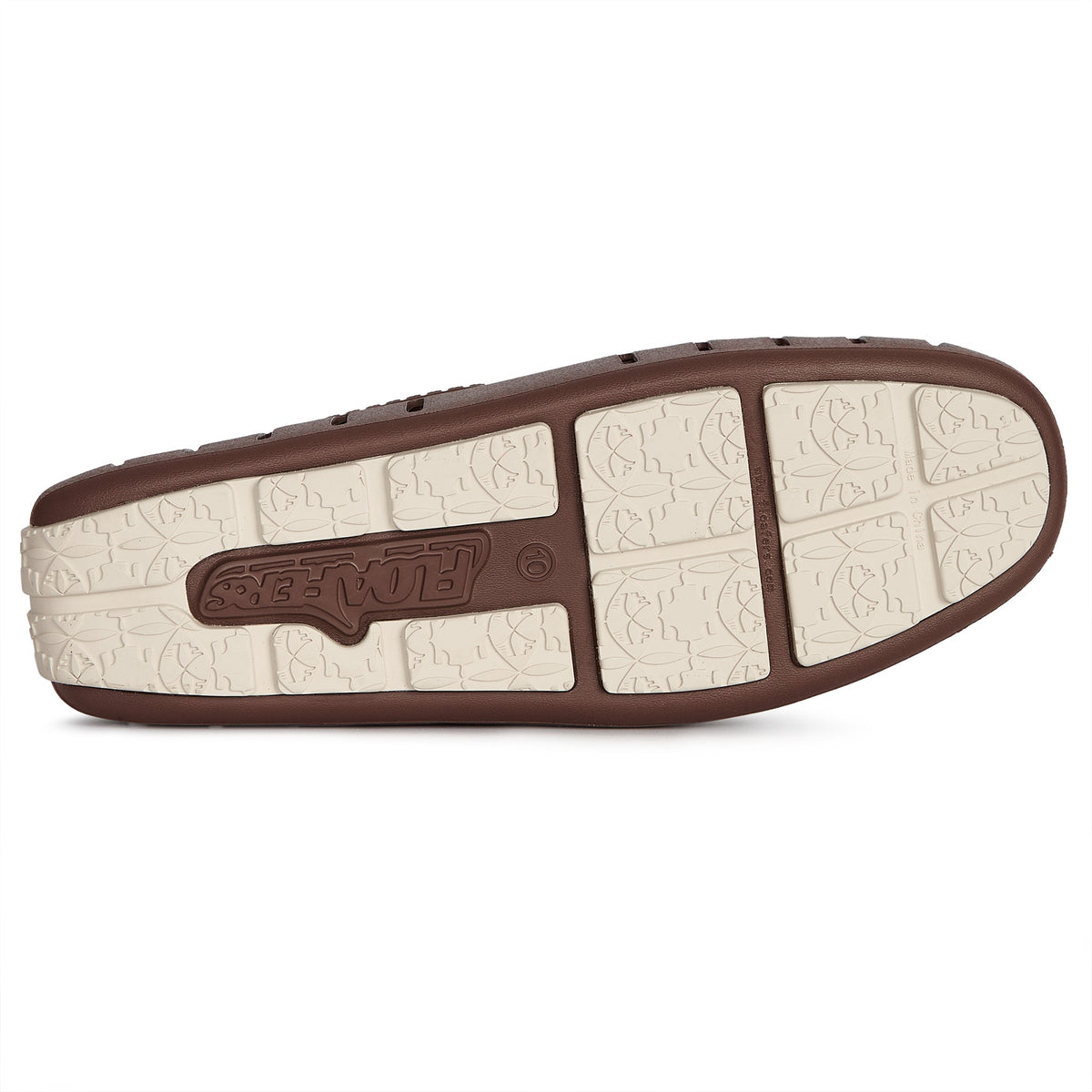 Men's brown loafer sole with textured traction pattern