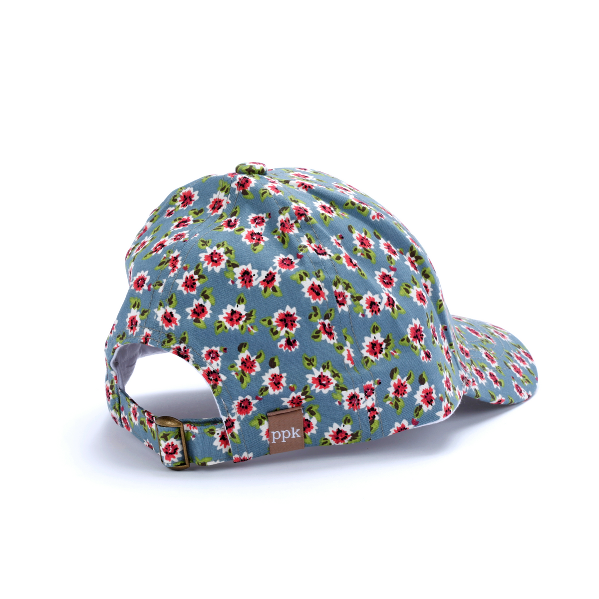 Back of a blue floral baseball cap showing the adjustable strap and opening.