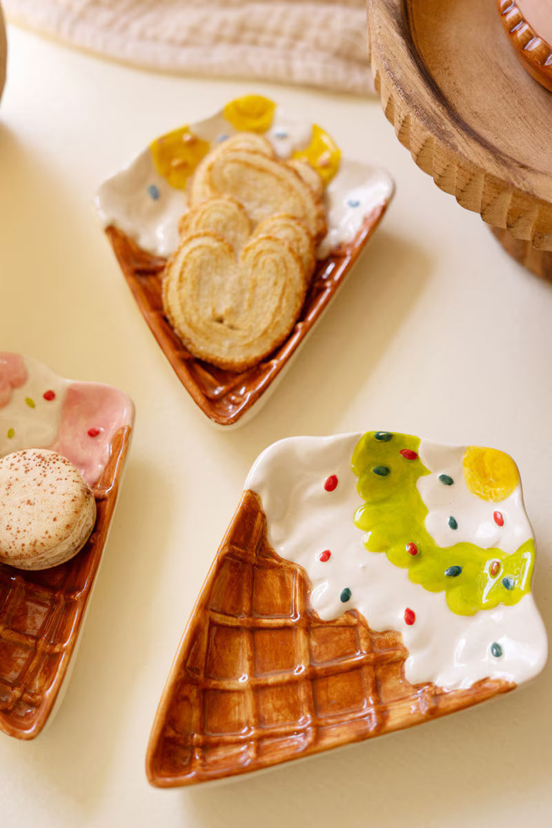 Ceramic ice cream cone snack plate with white icing and macaron-like scoops, three views
